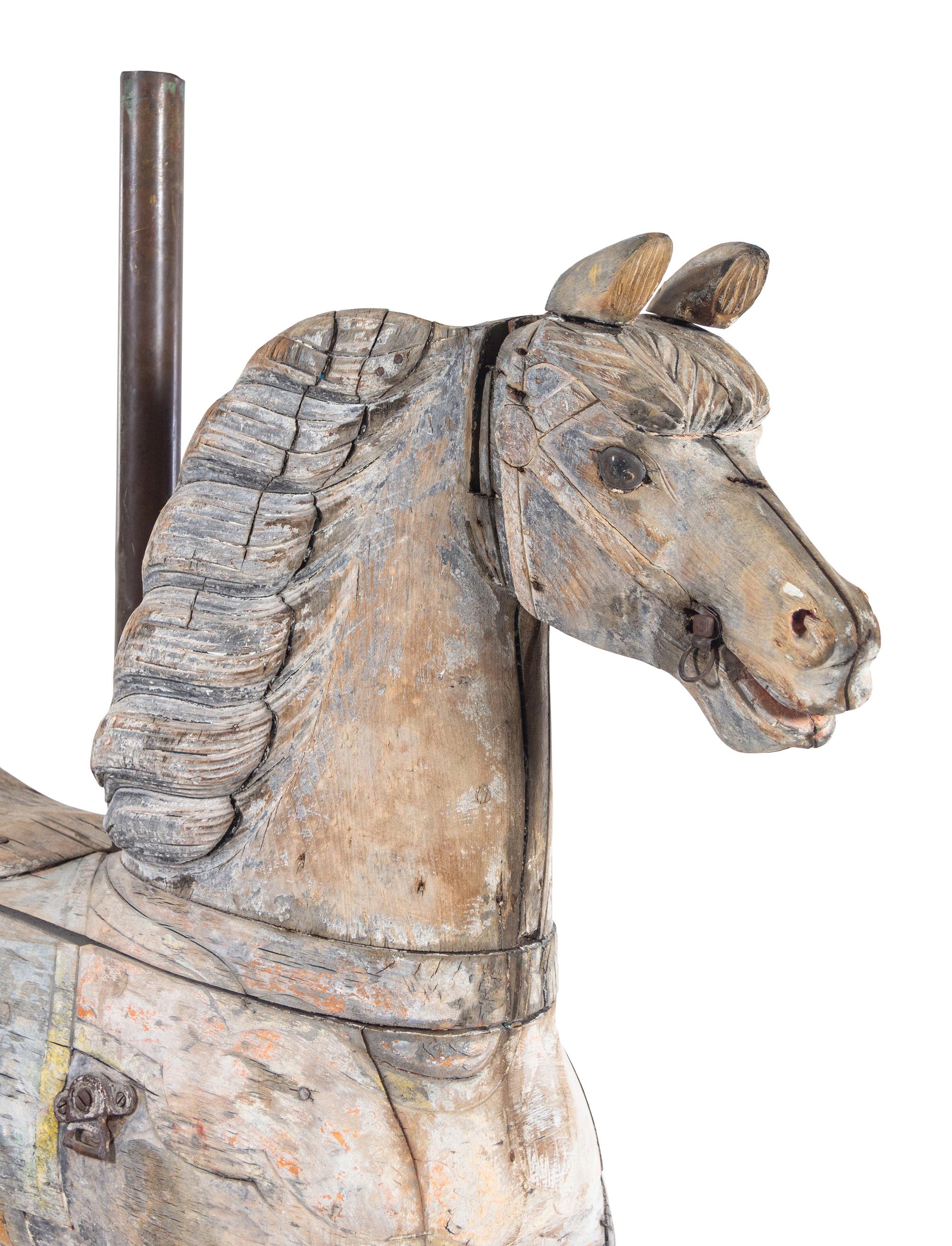 A Carved Pine Horse Form Carousel Figure