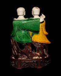A Chinese Sanca i Glazed Porcelain Figural Group