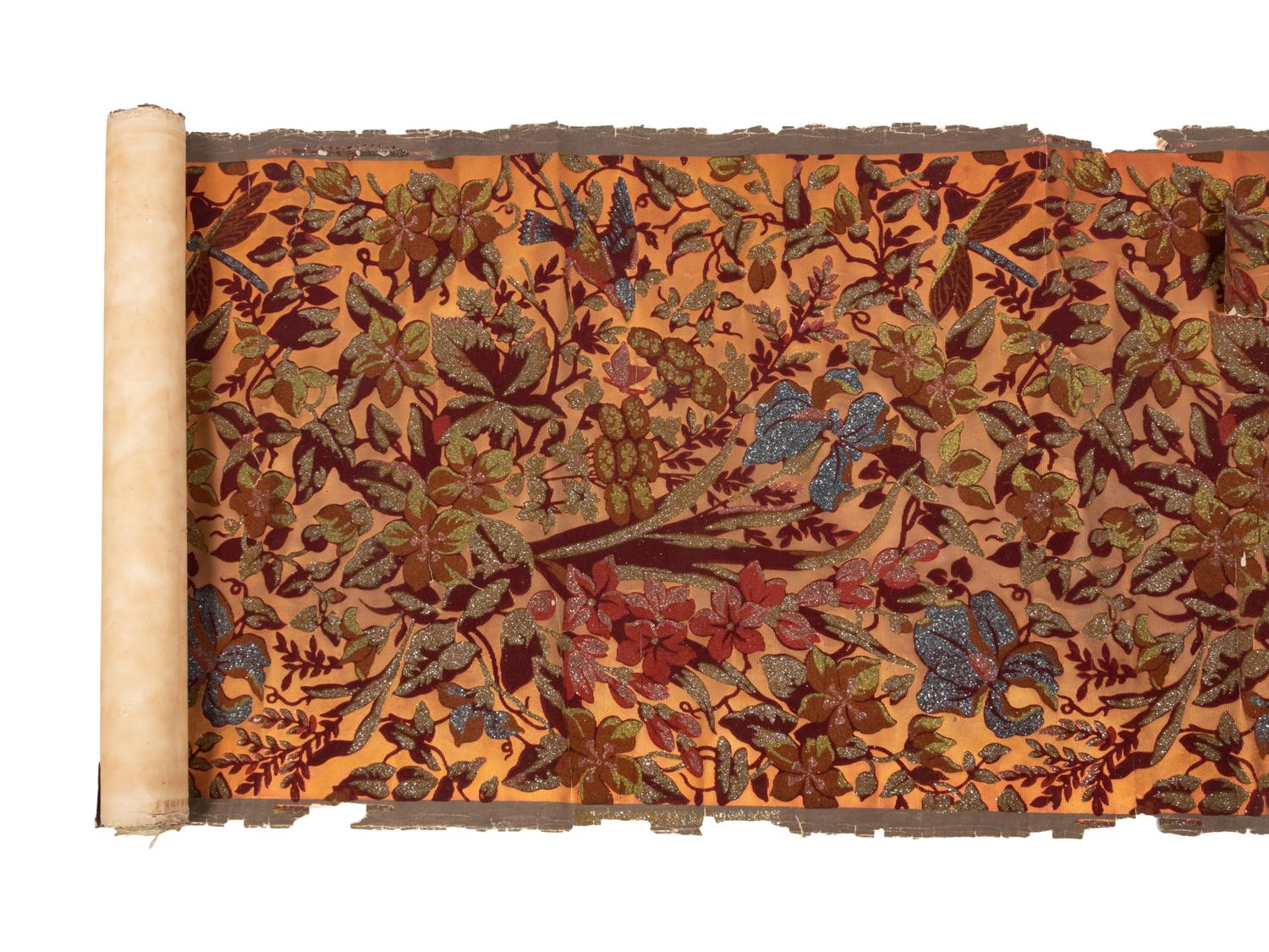 A Group of Three Upholstered Throw Pillows
