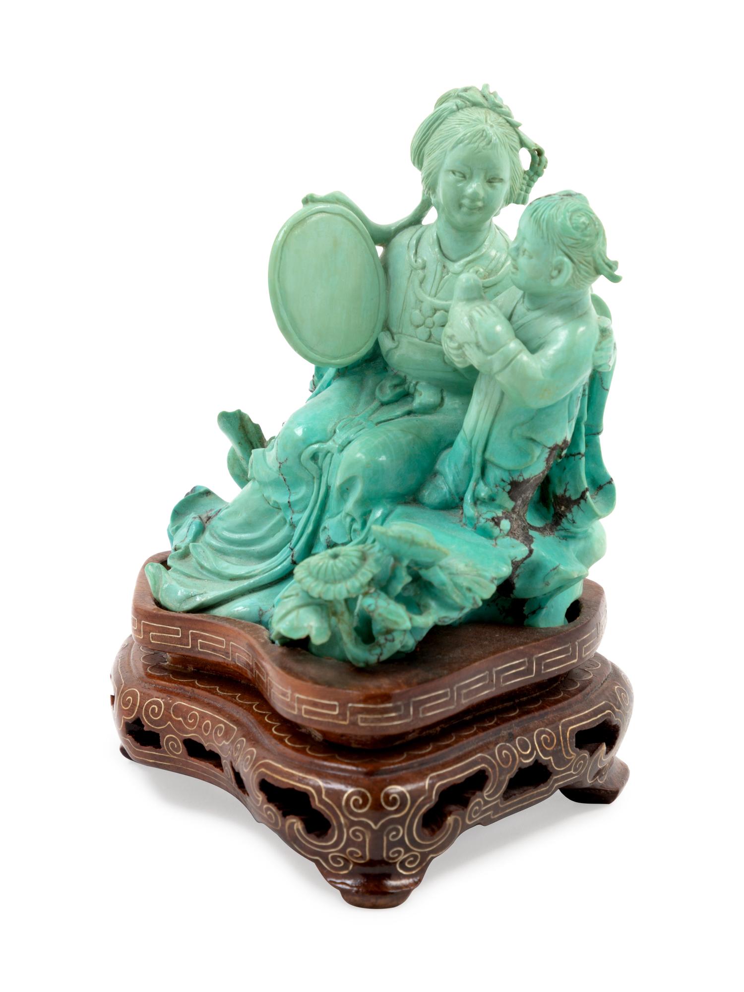 A Chinese Carved Turquoise Figural Group