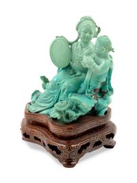 A Chinese Carved Turquoise Figural Group