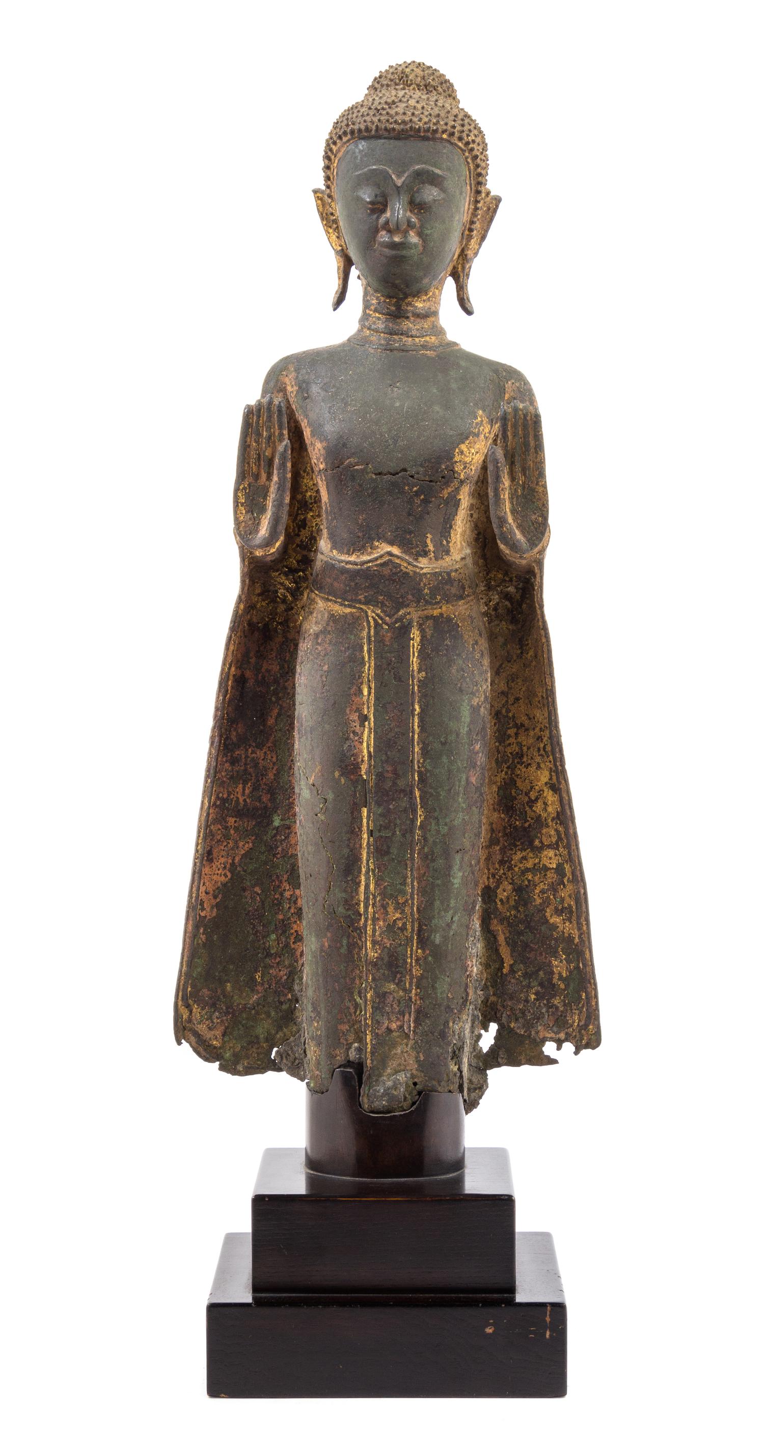 A Thai Parcel Gilt Bronze Buddha 17TH CENTURY Height of figure 22 inches. — 17TH CENTURY