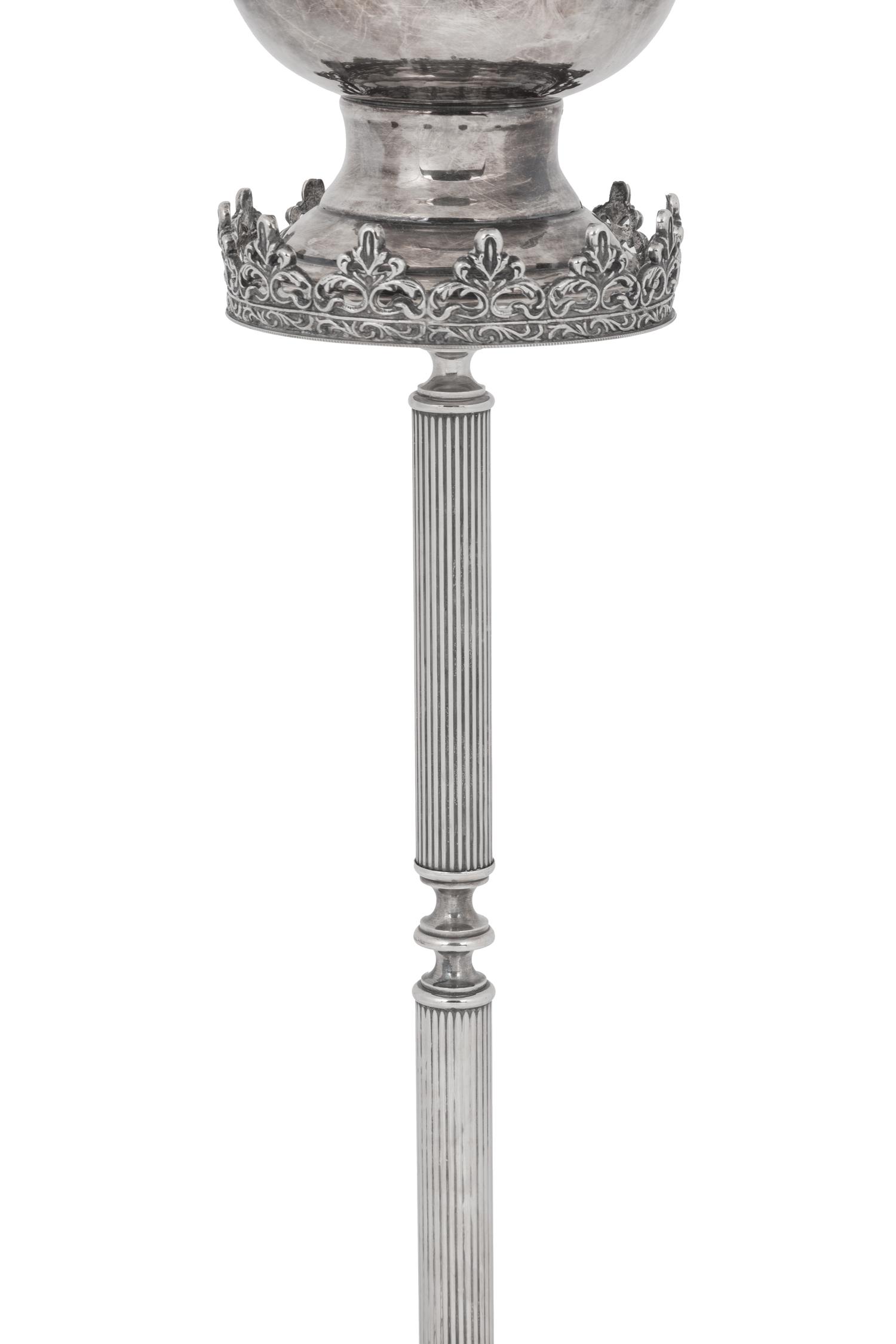 A Silvered Metal Candle Stand
