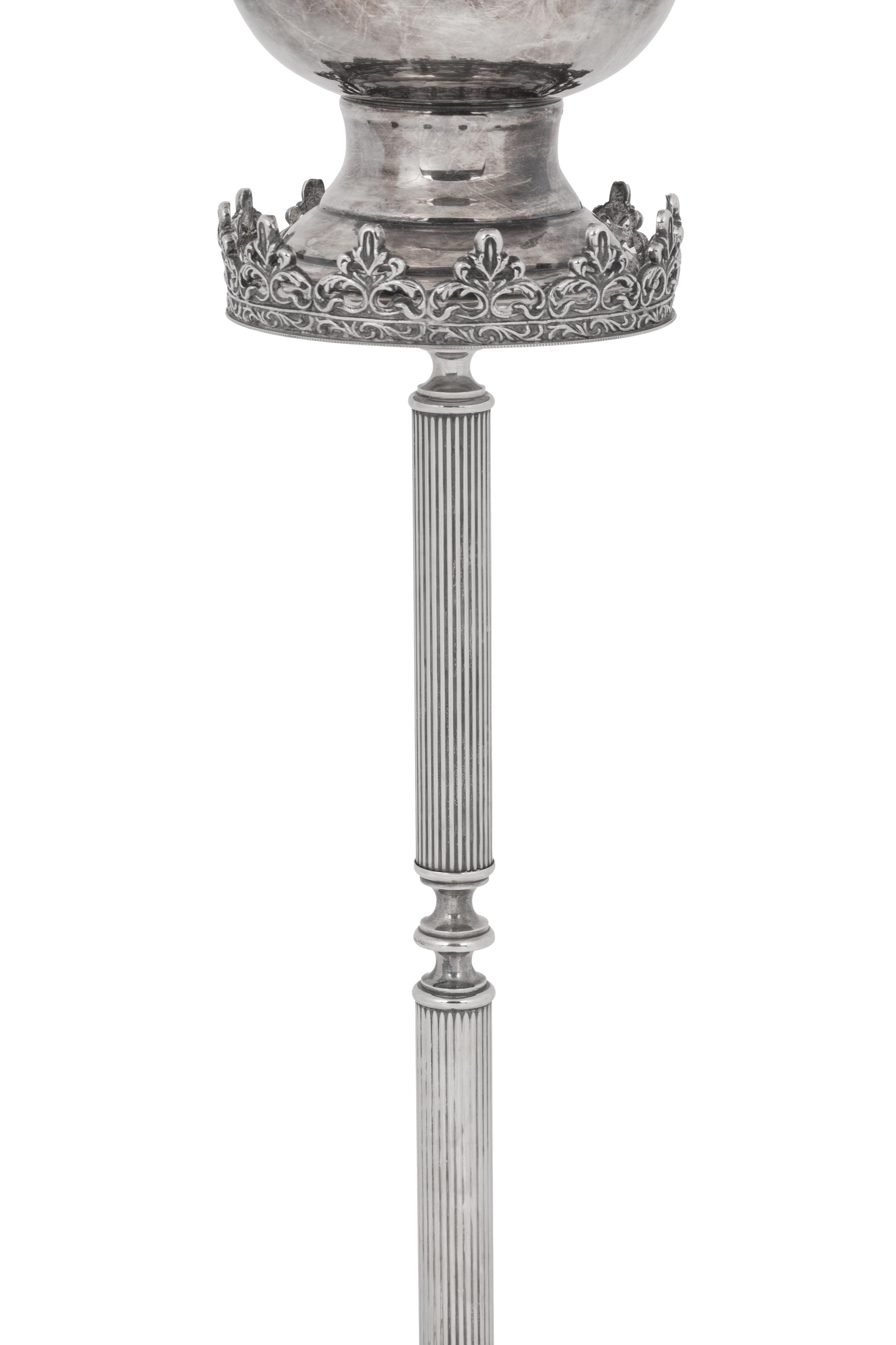 A Silvered Metal Candle Stand