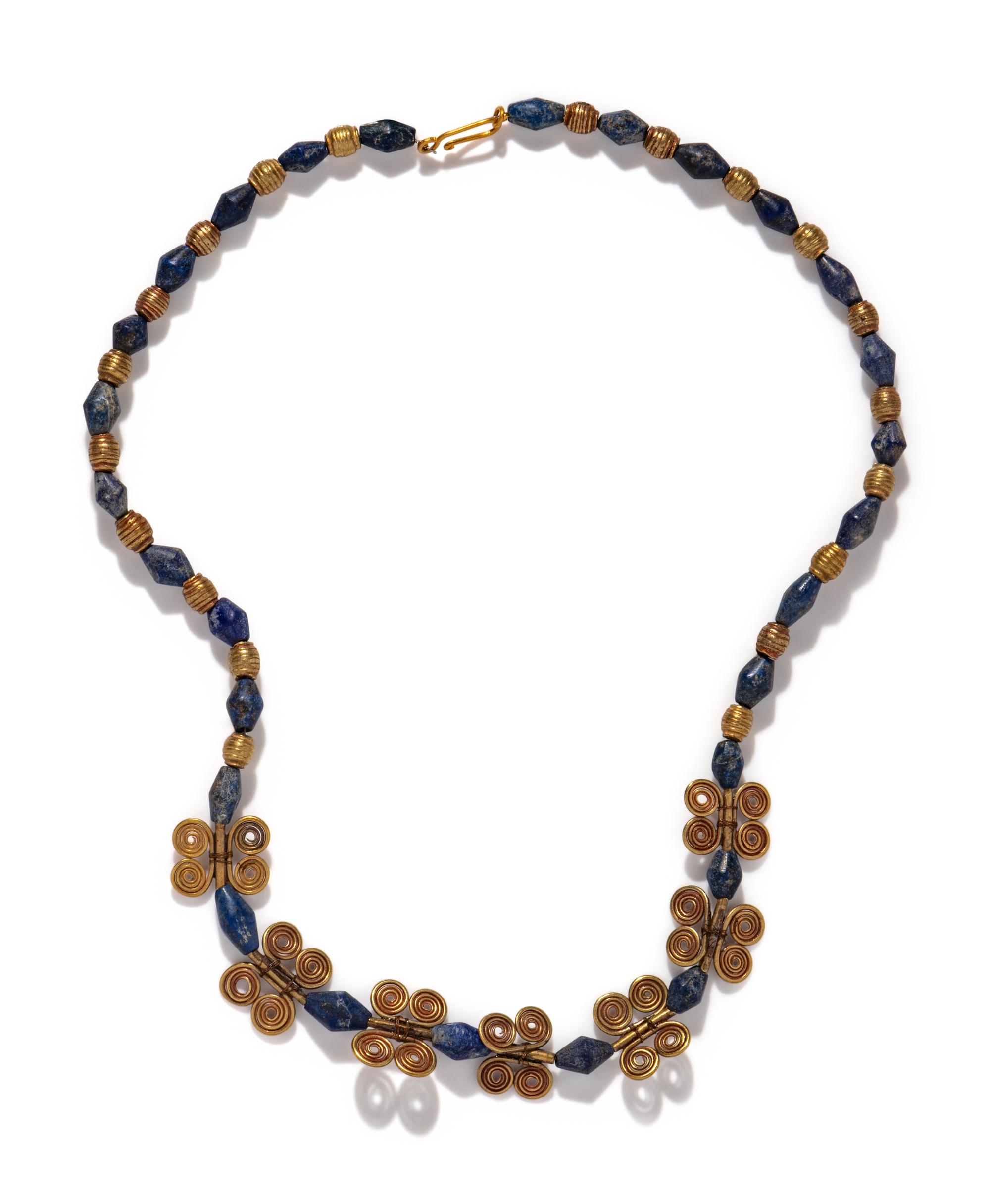A Western Asiatic Gold and Lapis Lazuli Bead Necklace