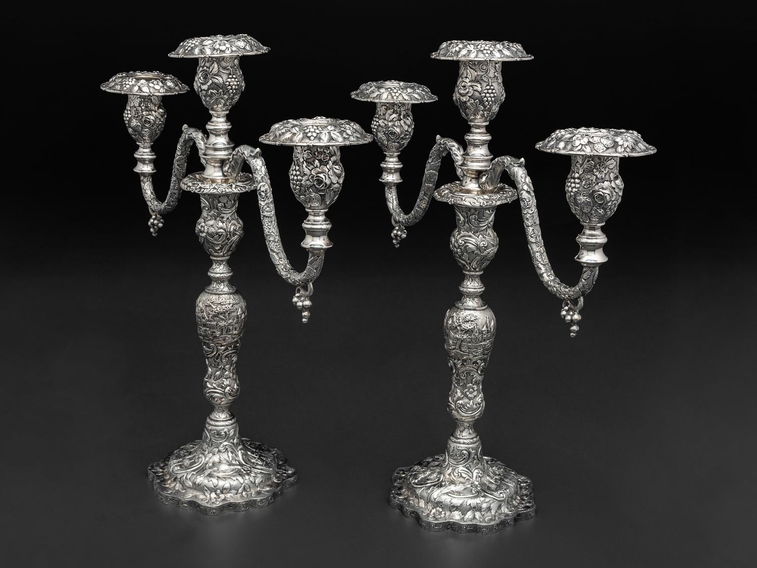A Pair of American Repousse Silver Candelabra