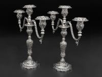 A Pair of American Repousse Silver Candelabra