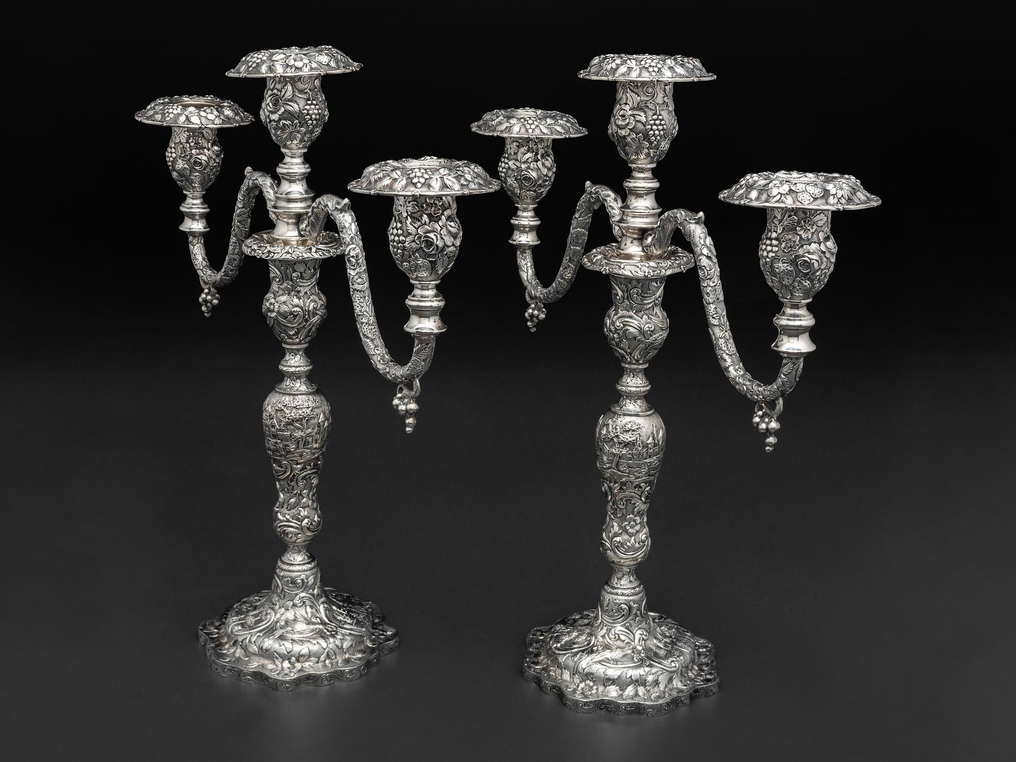 A Pair of American Repousse Silver Candelabra