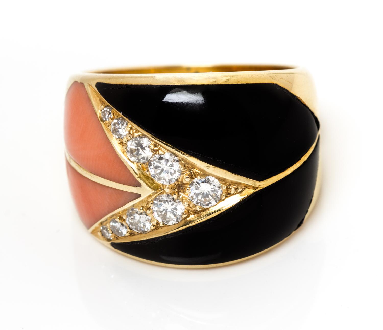 An 18 Karat Yellow Gold, Diamond, Onyx, and Coral Ring, Cartier, 6.70 dwts.