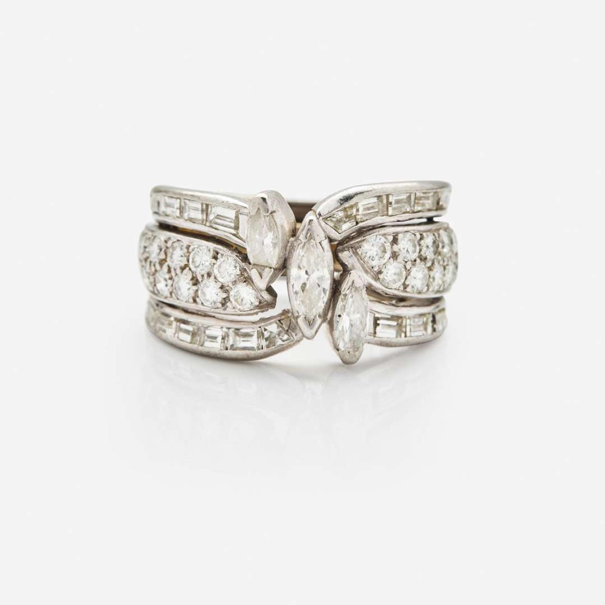 A Ladies 18K White Gold and Diamond Ring