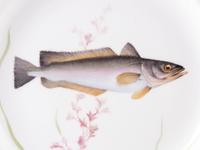 A Set of Twelve Royal Copenhagen Parcel Gilt Porcelain Fish Plates