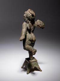 A Roman Bronze Figure of Eros