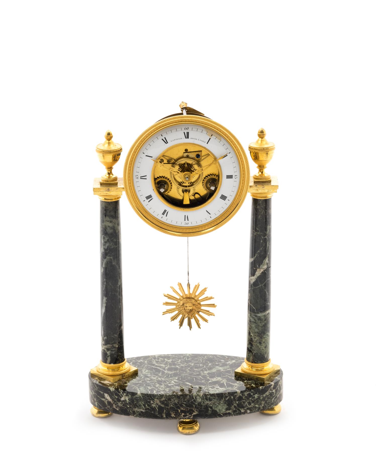 A Directoire Gilt Bronze and Marble Mantel Clock