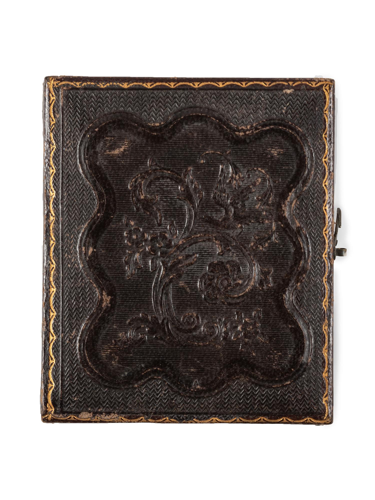 [EARLY PHOTOGRAPHY]. Ninth plate daguerreotype portrait of a man wearing a top hat and holding a revolver to his chest. New York: Holmes, n.d.
