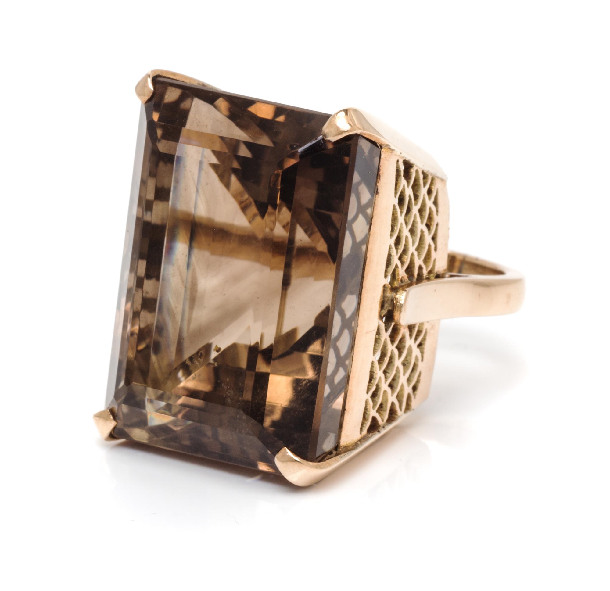 A 14 Karat Yellow Gold and Smoky Quartz Ring, 16.70 dwts.