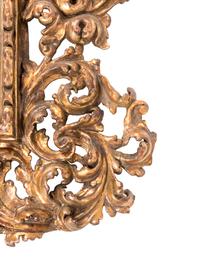 A Florentine Rococo Revival Carved Giltwood Overmantel Mirror