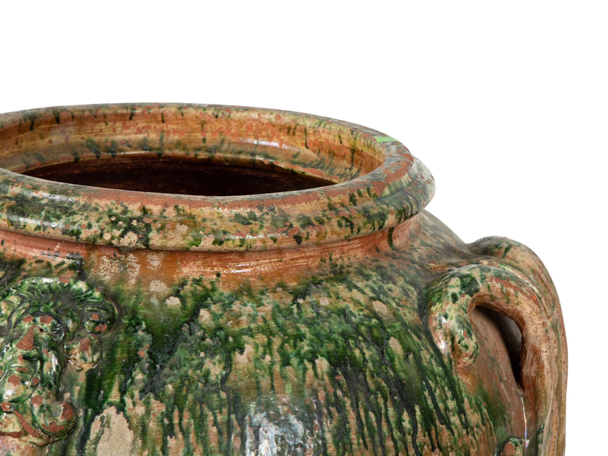 An Italian Green Glazed Terra Cotta Large Oil Jar