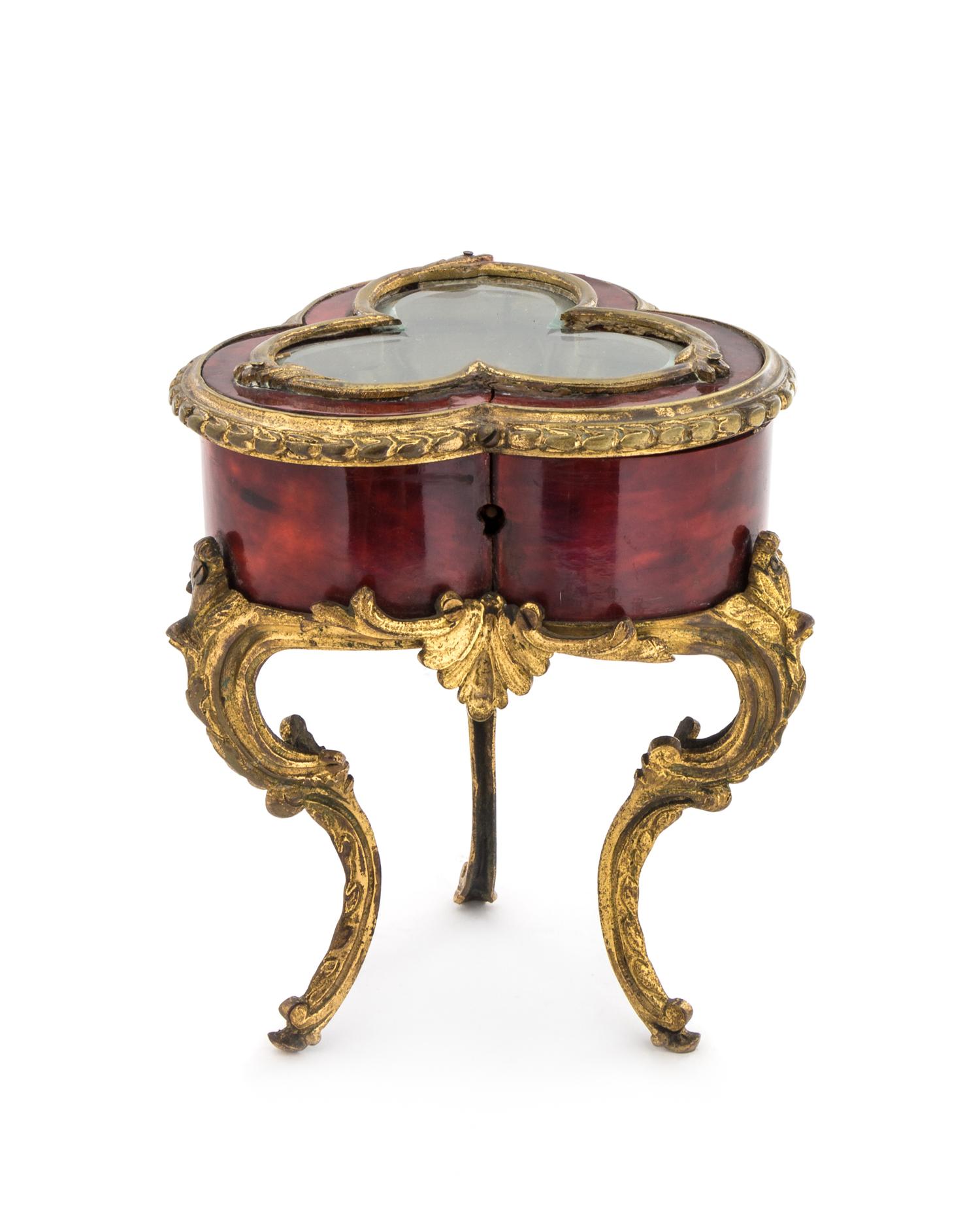 A Louis XV Style Gilt Bronze Mounted Tortoiseshell Diminutive Table Vitrine Height 6 1/4 inches. — LATE 19TH CENTURY