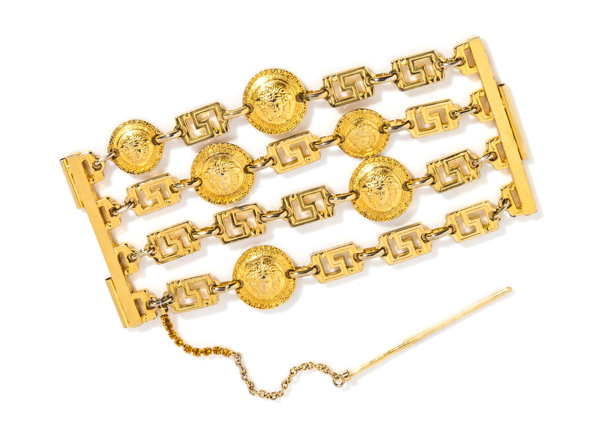 A Gianni Versace Four Strand Greco Link Bracelet, 7" x 3.5".