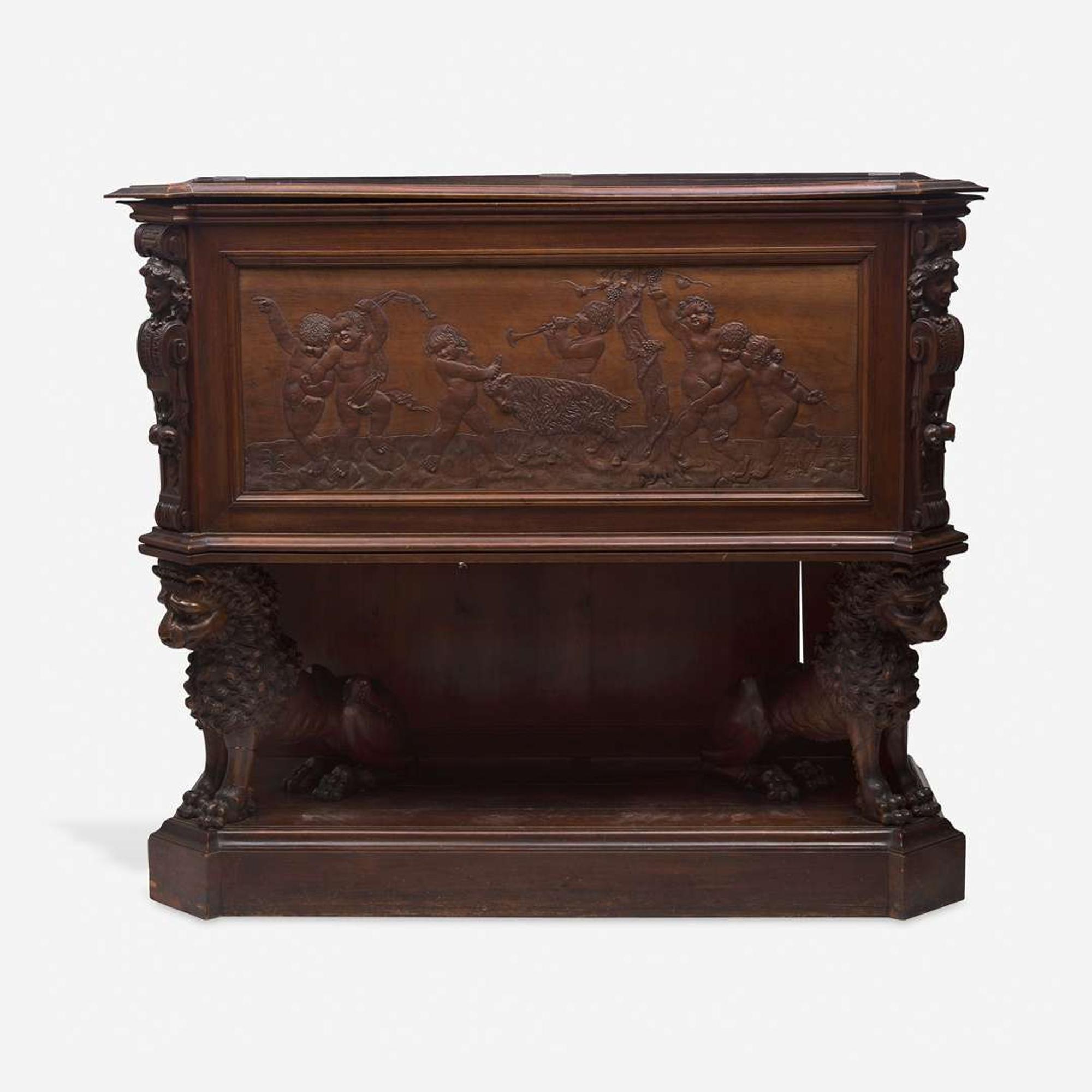 A Renaissance Revival Carved Walnut Chest on Stand Italian, 19th century