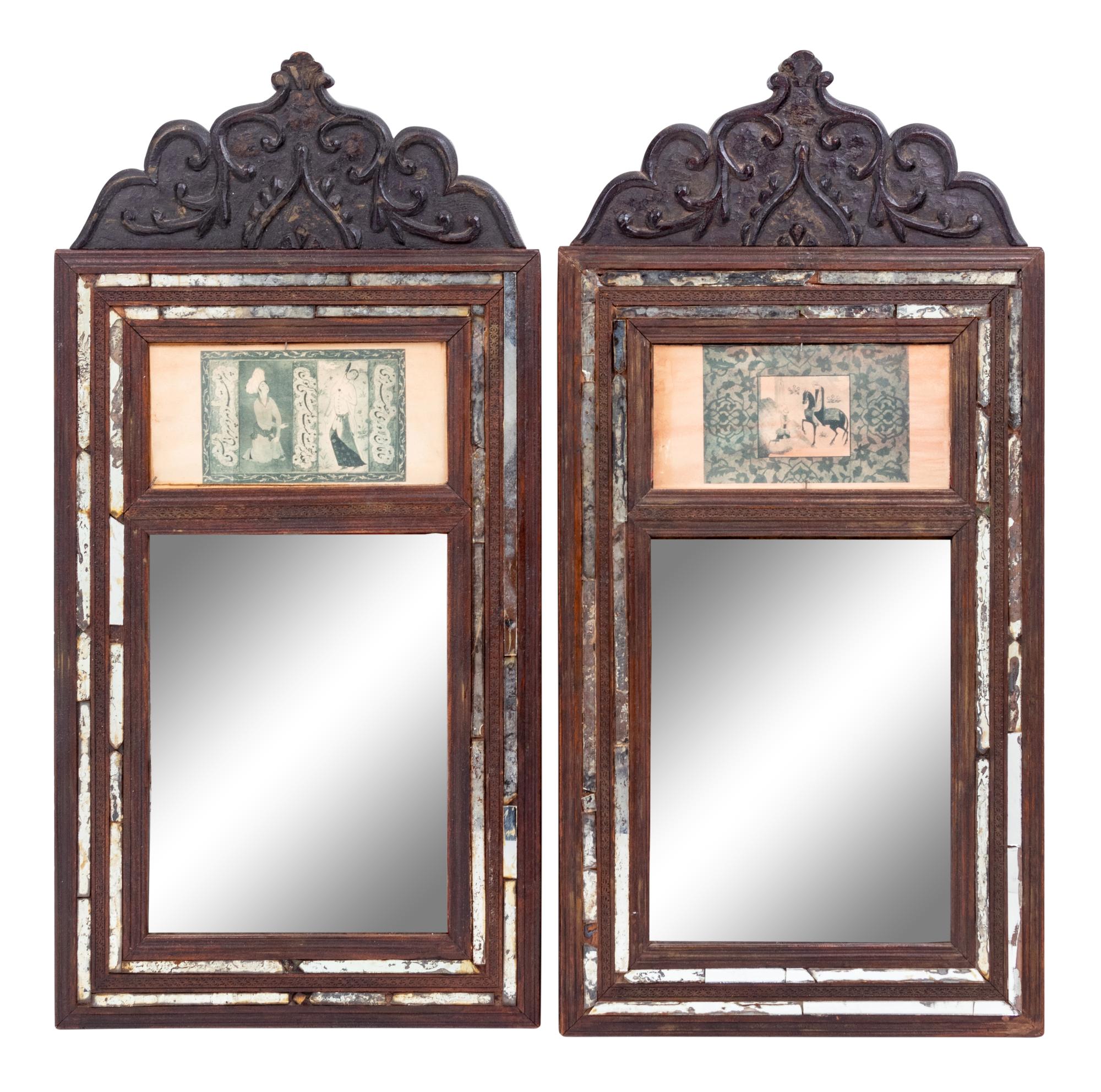 A Pair of Persian Carved Walnut Mirrors