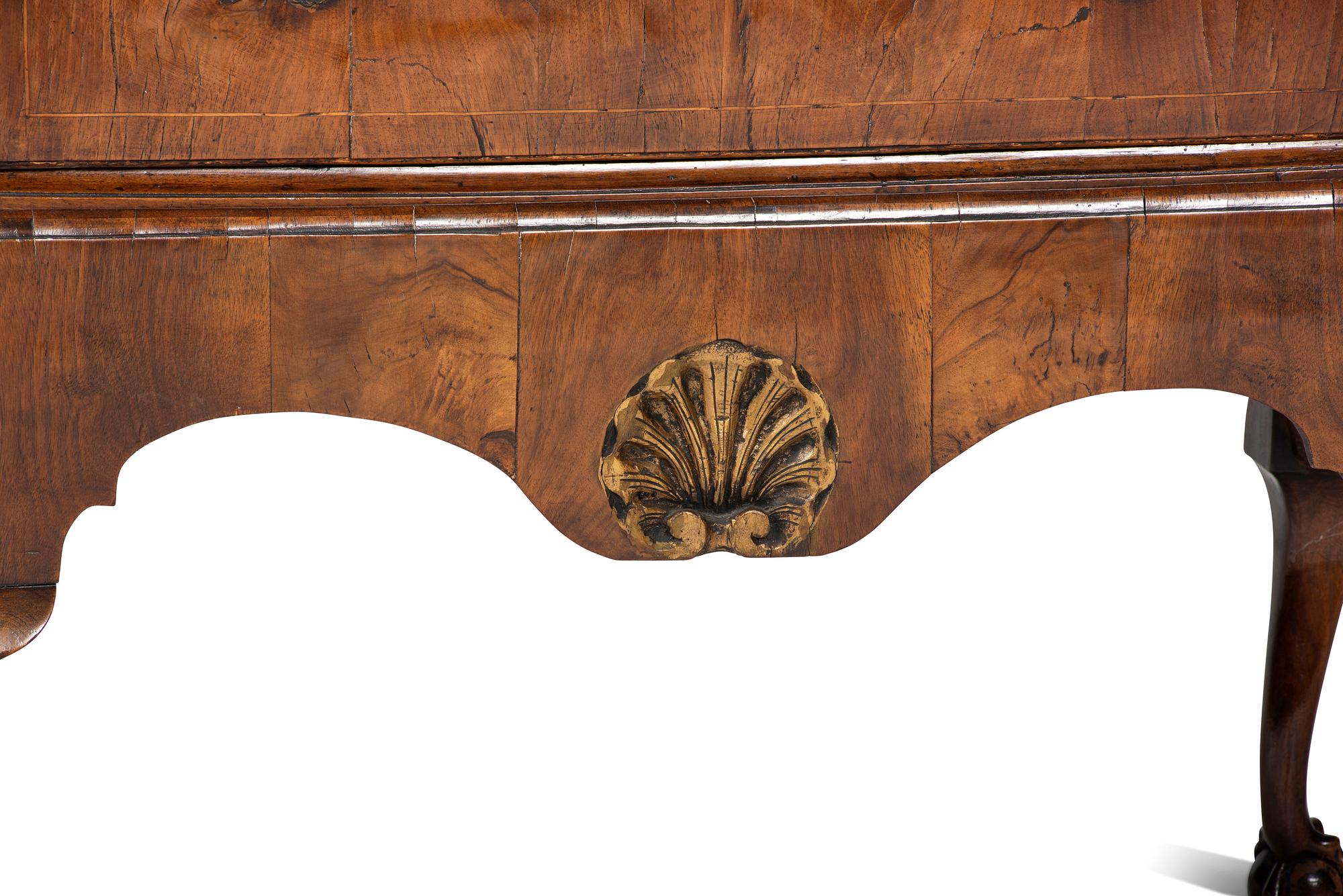 A George II Shell-Carved and Parcel Gilt Walnut-Veneered Chest-on-Stand