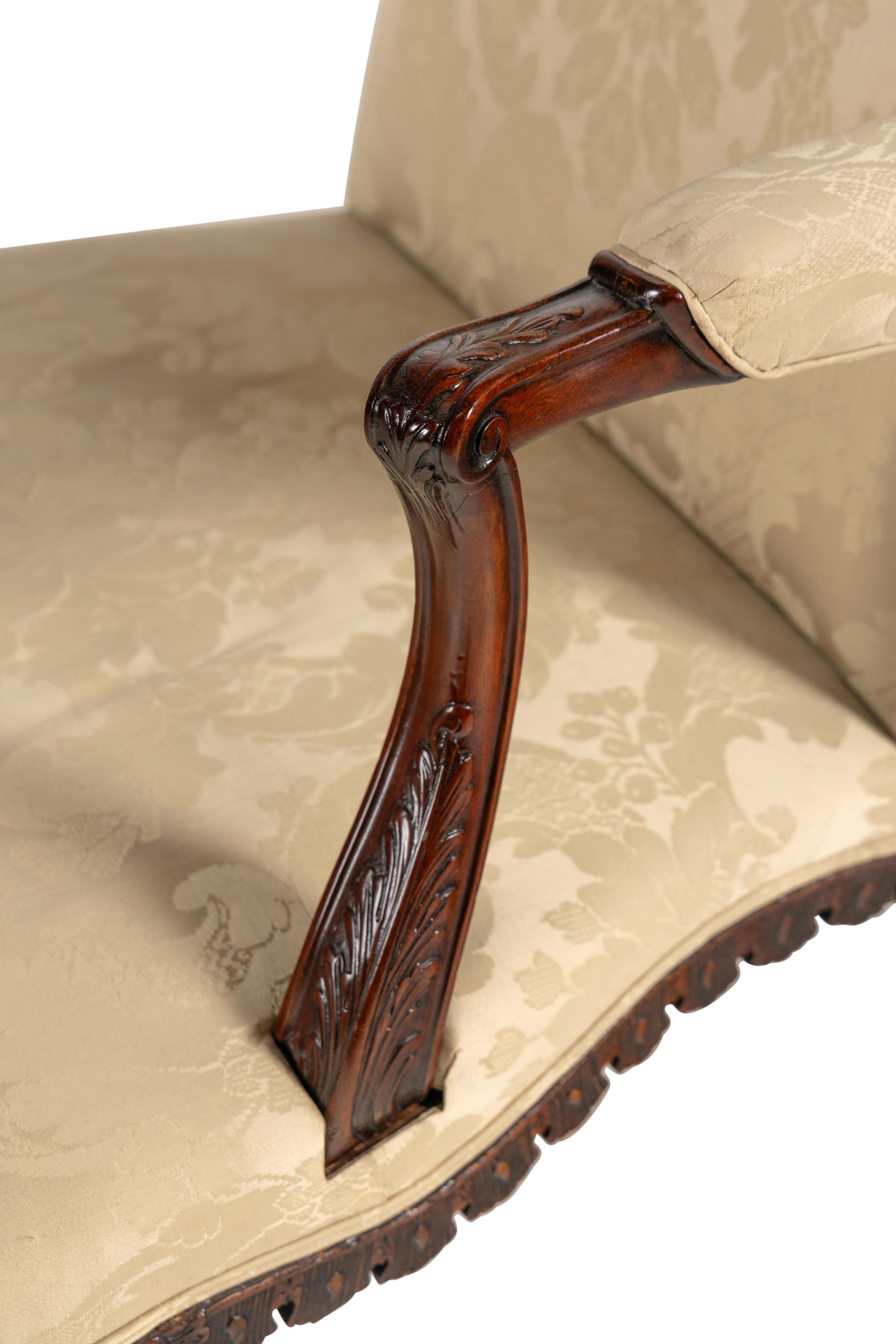 A George III Carved Mahogany Library Chair