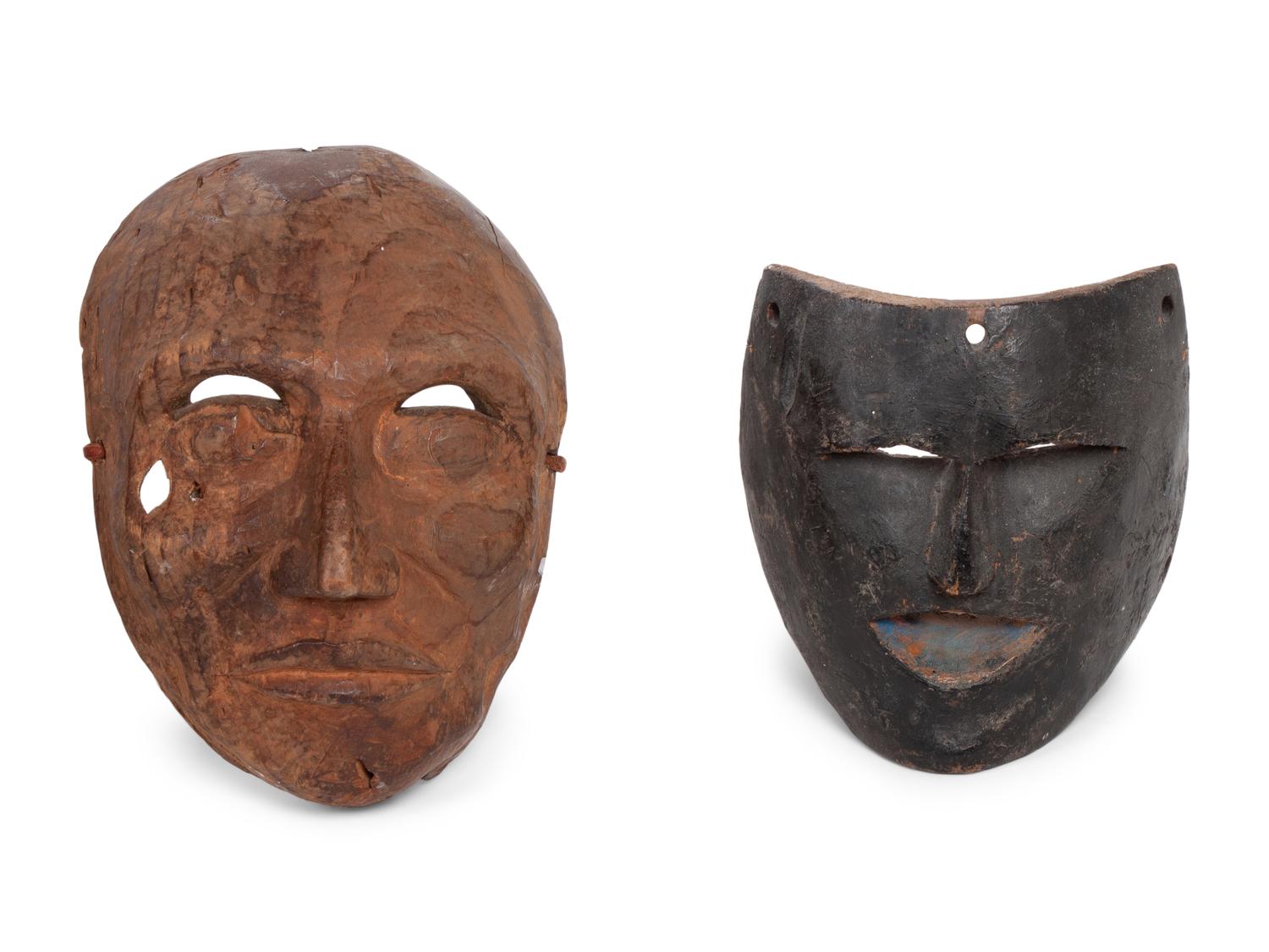 A Group of Ten Carved Ethnographic Masks