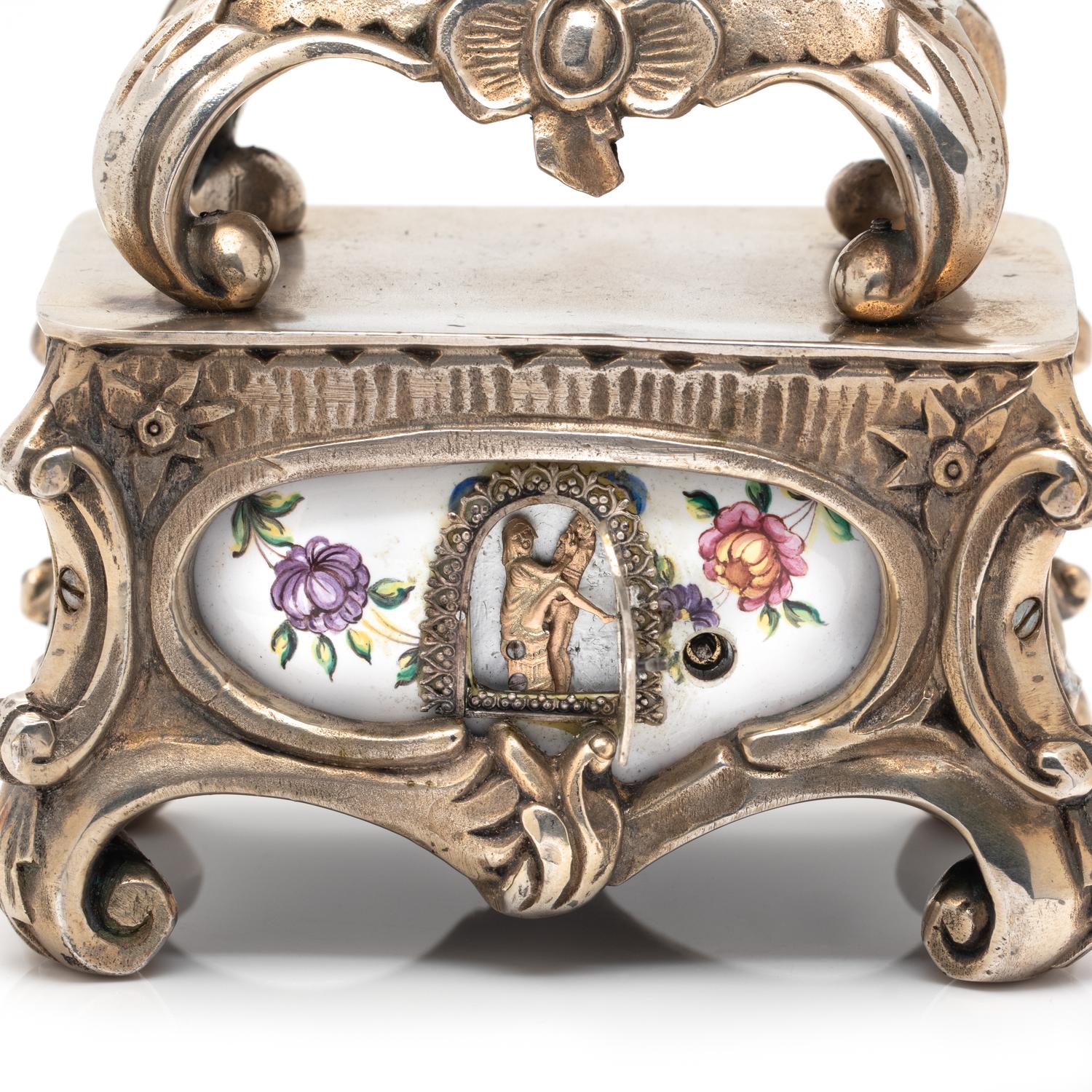 GILT-METAL AND ENAMEL CLOCK WITH HIDDEN AUTOMATON