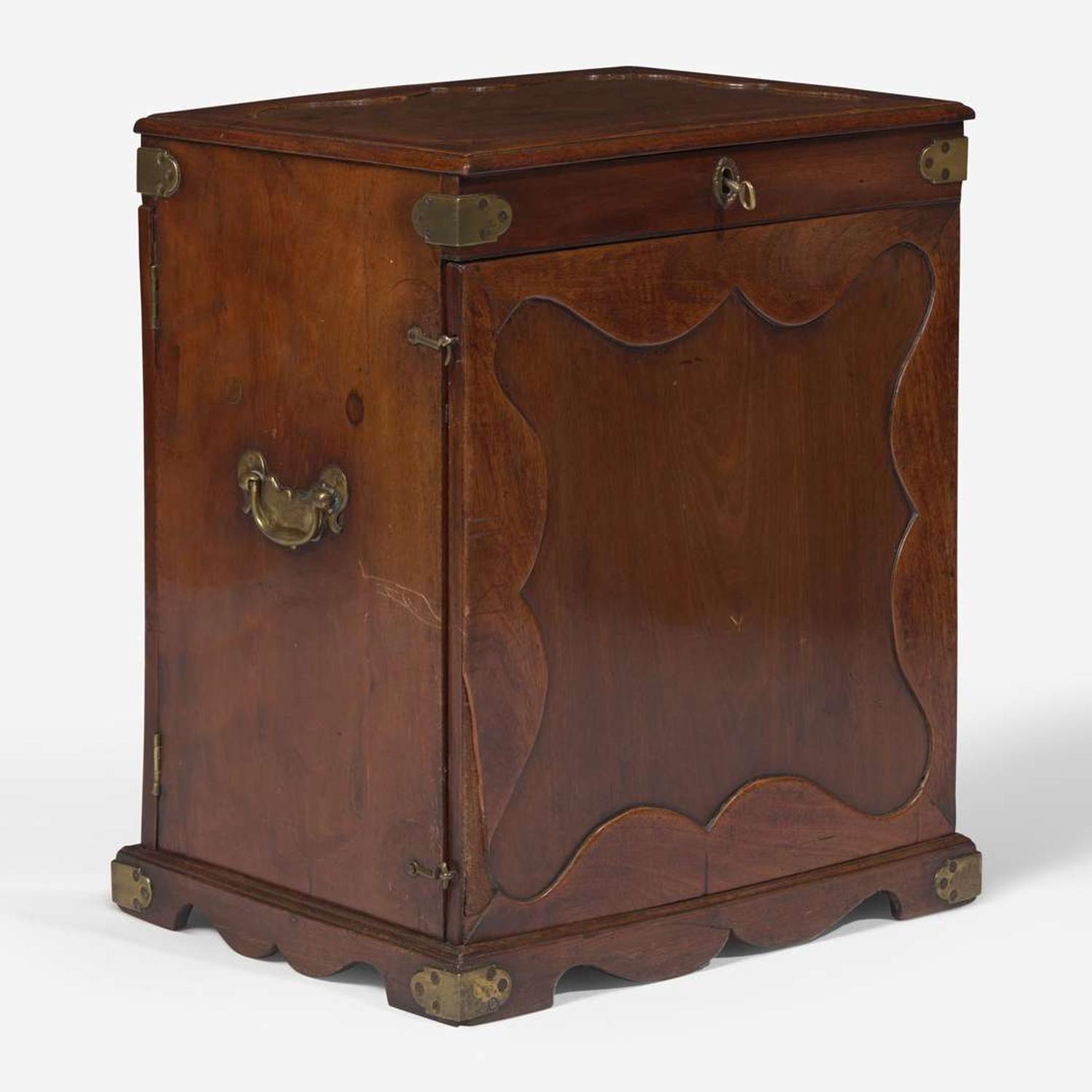 A George II carved mahogany apothecary cabinet circa 1740