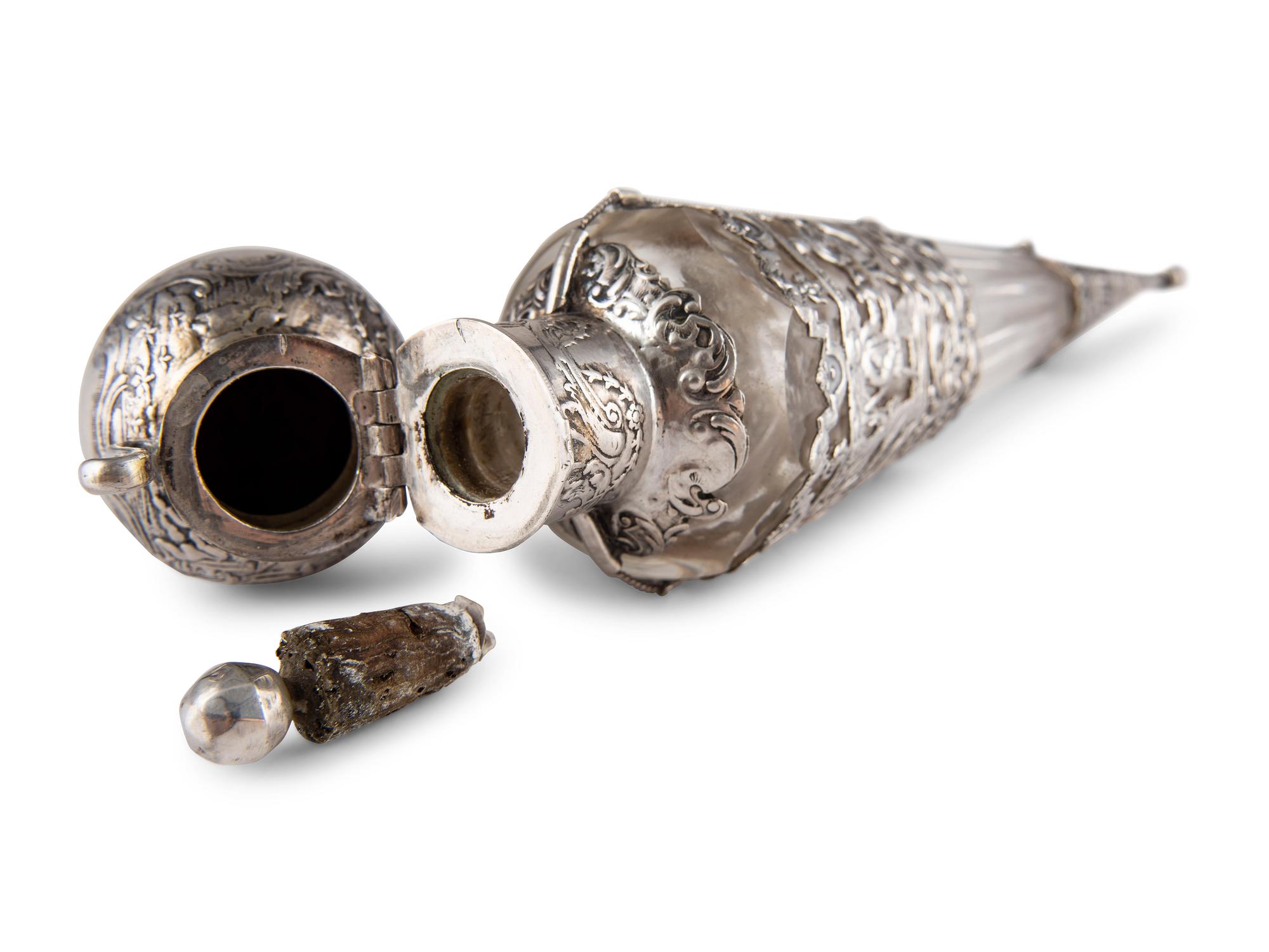 A Continental Silver Decanter, Beaker and Perfume