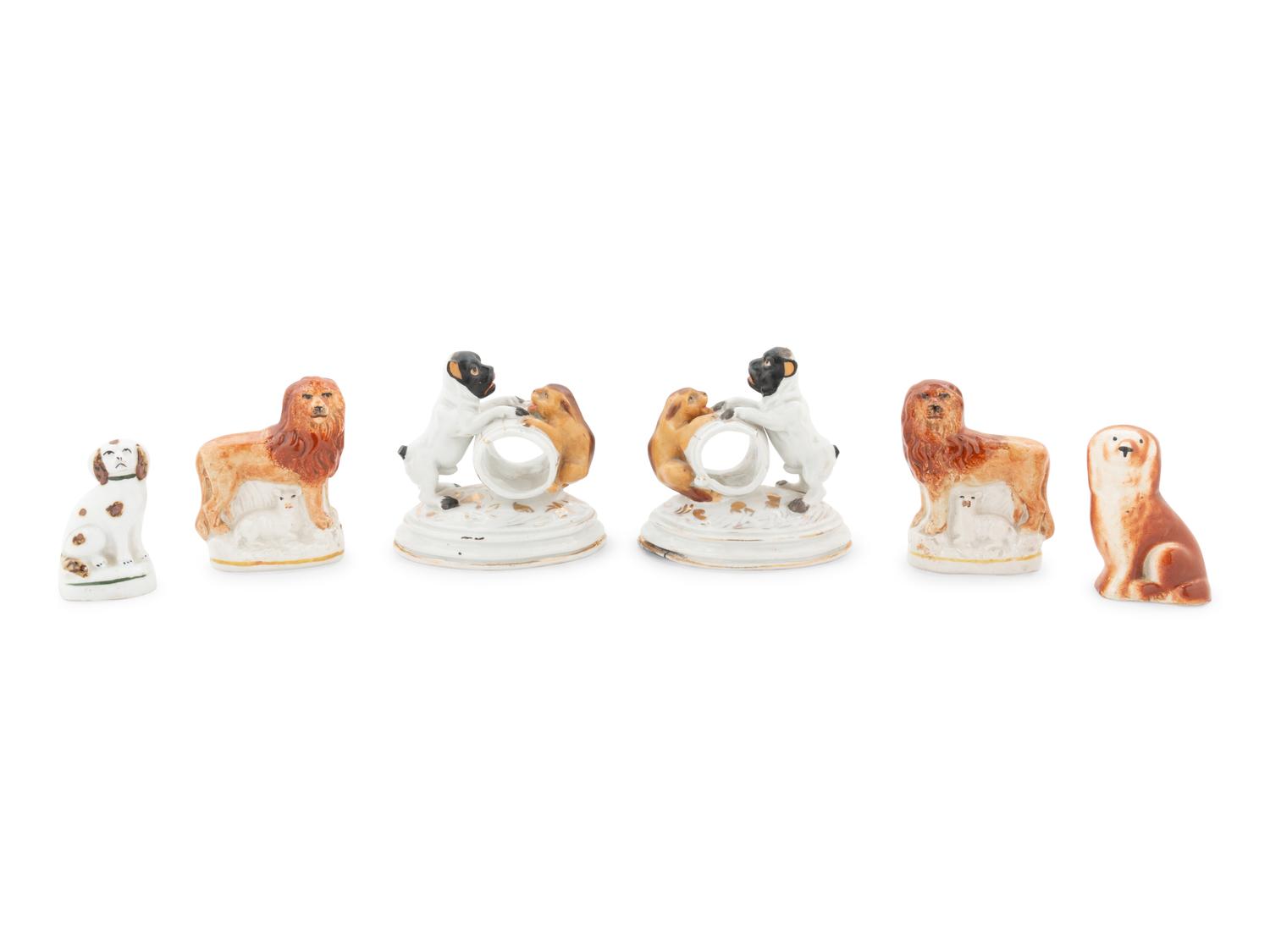 A Collection of Staffordshire Lions and Dogs