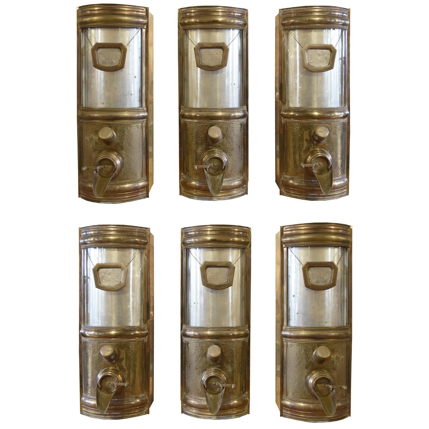 A Set of Six Brass and Glass Coffee Bean Dispensers 16" W x 17" D x 43" H — Germany, Circa 1900
