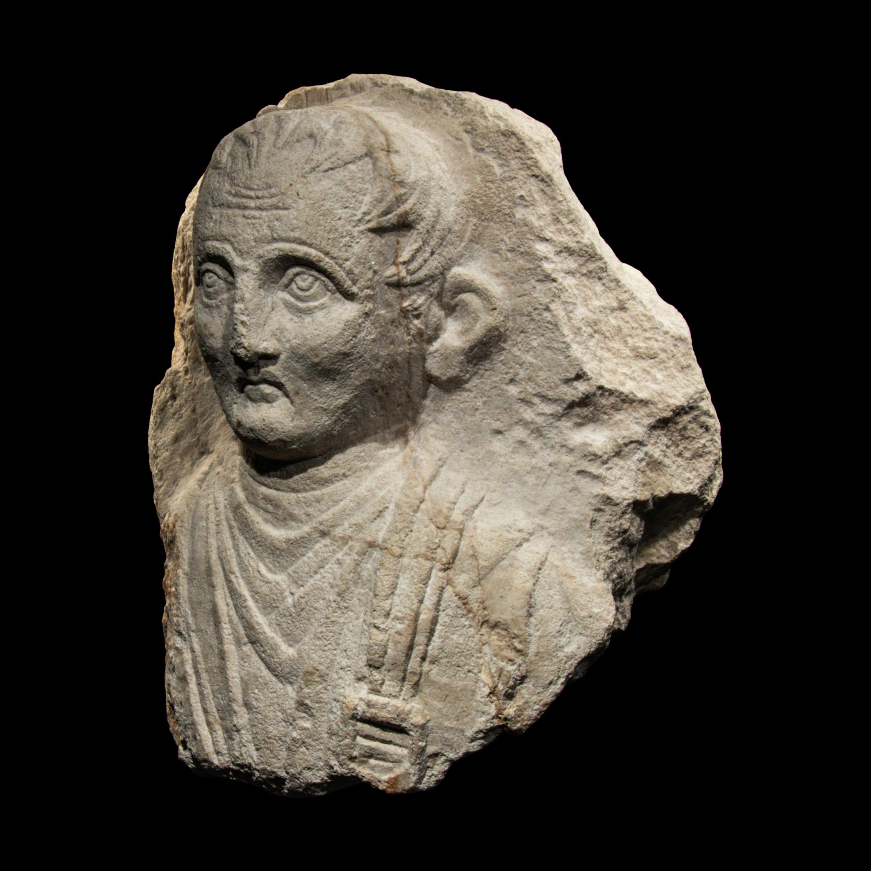 A Palmyrene Limestone Bust of a Man