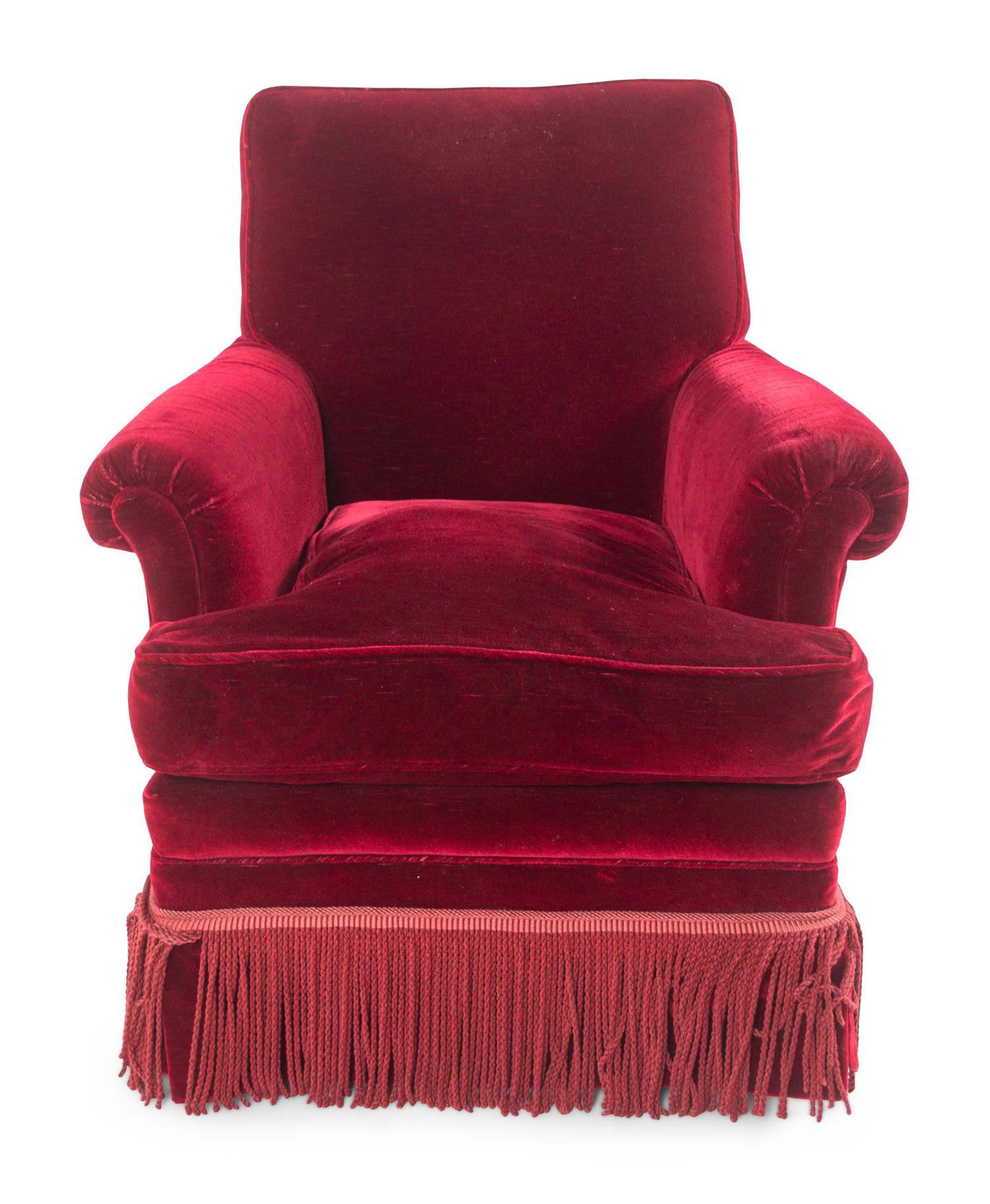 A Velvet-Upholstered Lounge Chair and Ottoman with Bullion Fringe
