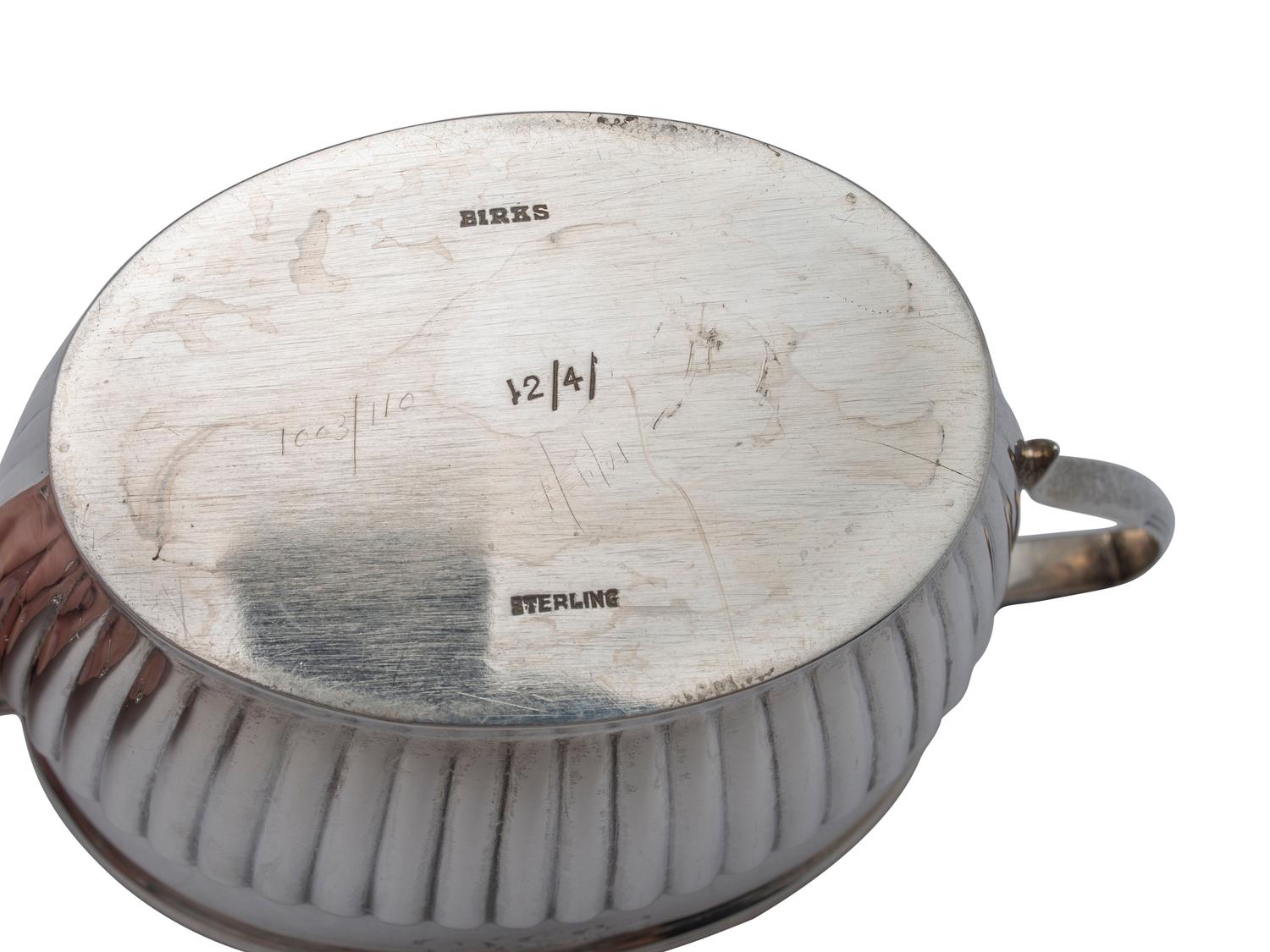 A Three-Piece Silver Tea Service