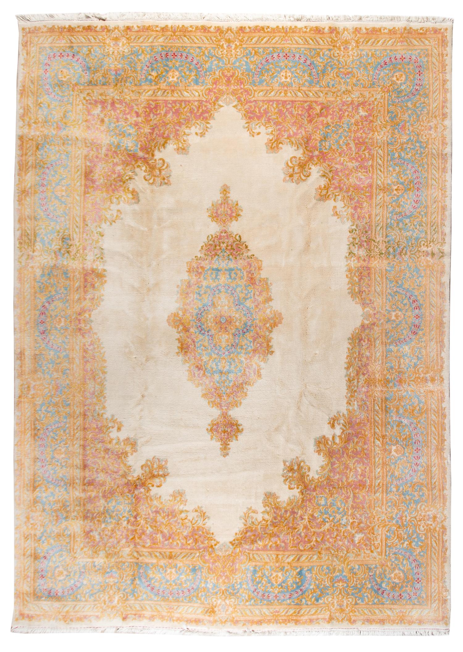 A Kirman Wool Rug 12 feet 4 inches x 8 feet 6 inches. — 20TH CENTURY
