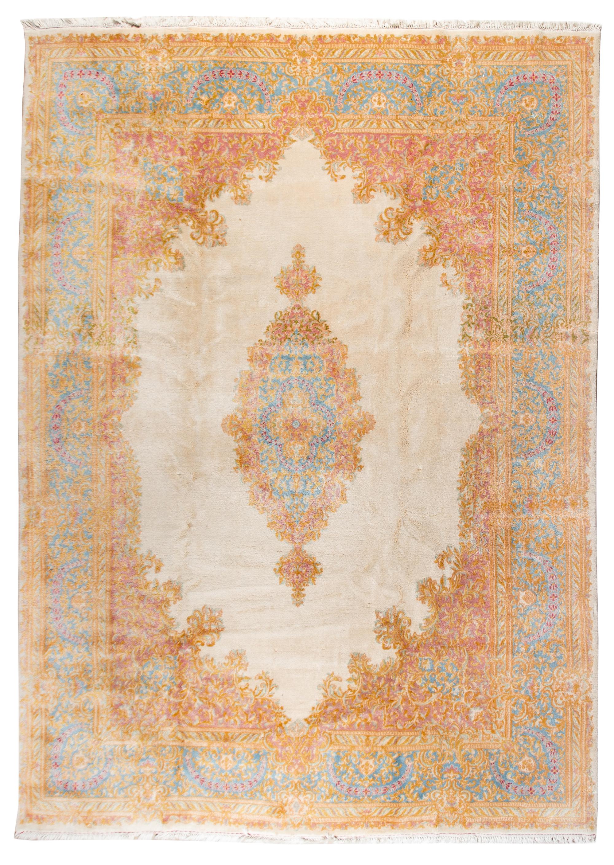 A Kirman Wool Rug 12 feet 4 inches x 8 feet 6 inches. — 20TH CENTURY