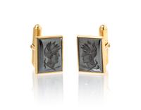 A Pair of 14 Karat Yellow Gold and Hematite Intaglio Cufflinks, 7.70 dwts.