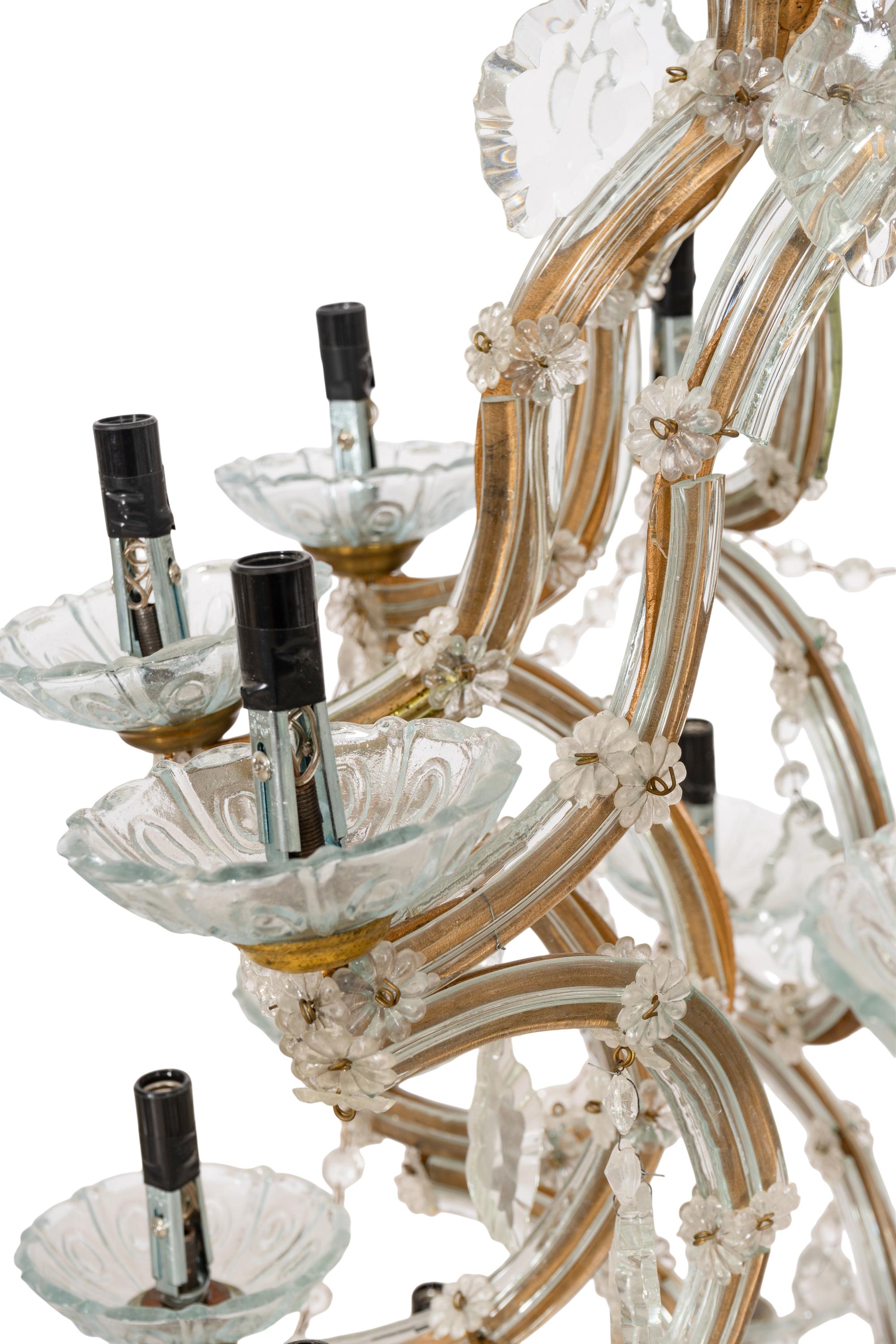 A Pair of Large Thirty-One-Light Cased Glass Chandeliers