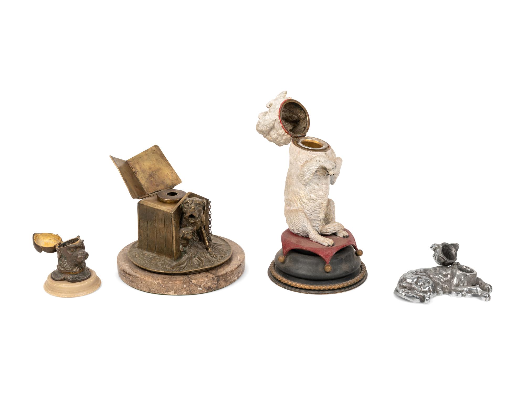 A Collection of Four Dog-Themed Inkwells