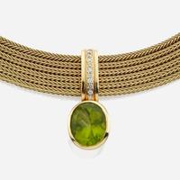 A peridot, diamond, and gold necklace