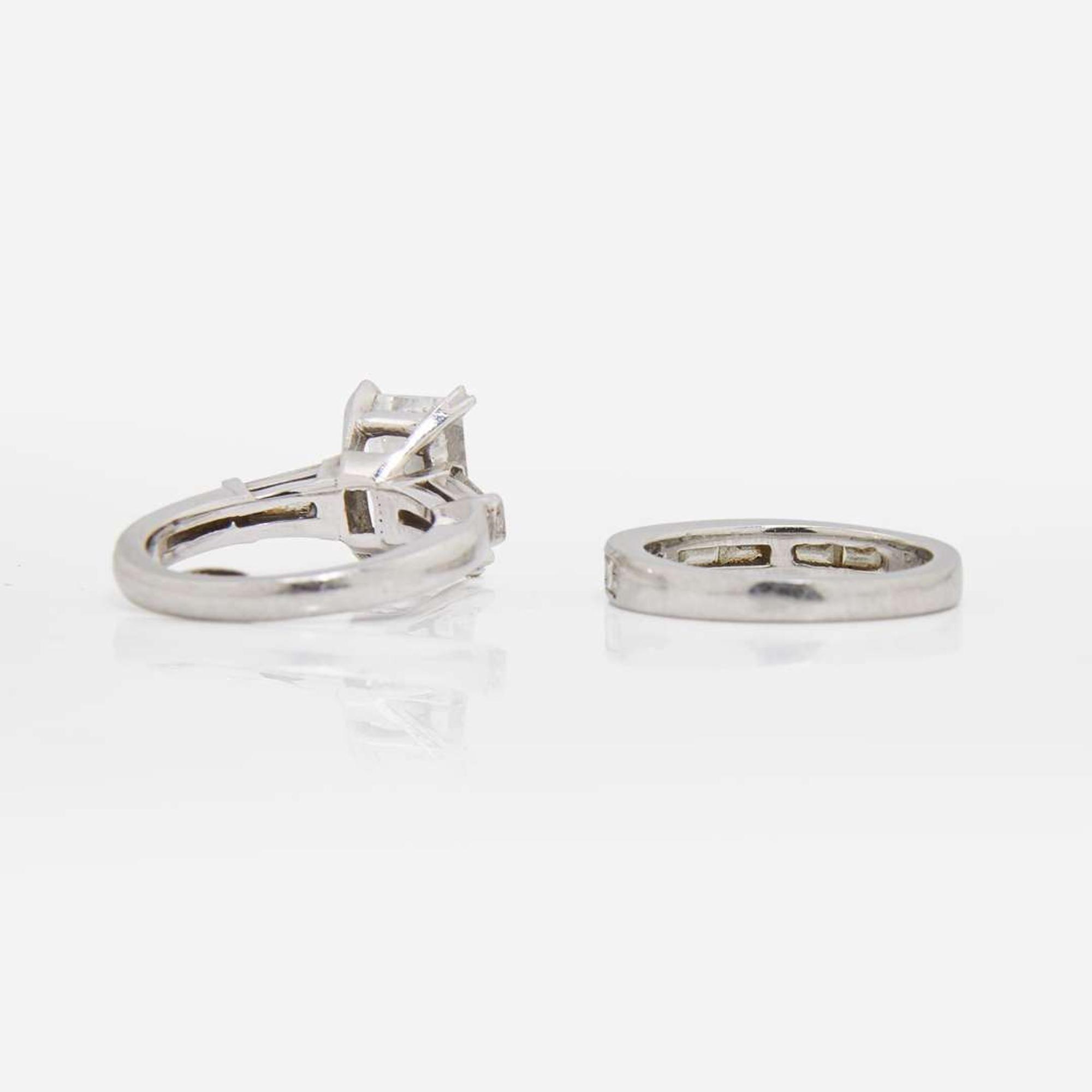 An Emerald-Cut Diamond and Platinum Ring and Band 2.25 Carat Emerald-Cut Diamond, GIA Certified