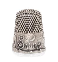 An American Silver Commemorative Thimble, Ketcham & McDougall, New York, NY, the dimpled top and body above a band commemorating the 16