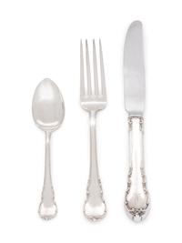 in the Modern Victorian pattern, comprising: 10 dinner knives with stainless steel blades 10 butter spreaders 10 dinner forks 9 salad forks 10 shrimp forks 1 pickle fork 20 teaspoons 10 soup spoons 2 iced tea spoons 82 pieces total.