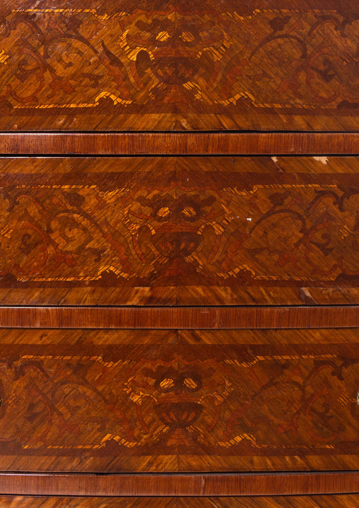 A Louis XV/XVI Transitional Style Gilt Bronze Mounted Marquetry Chest of Drawers