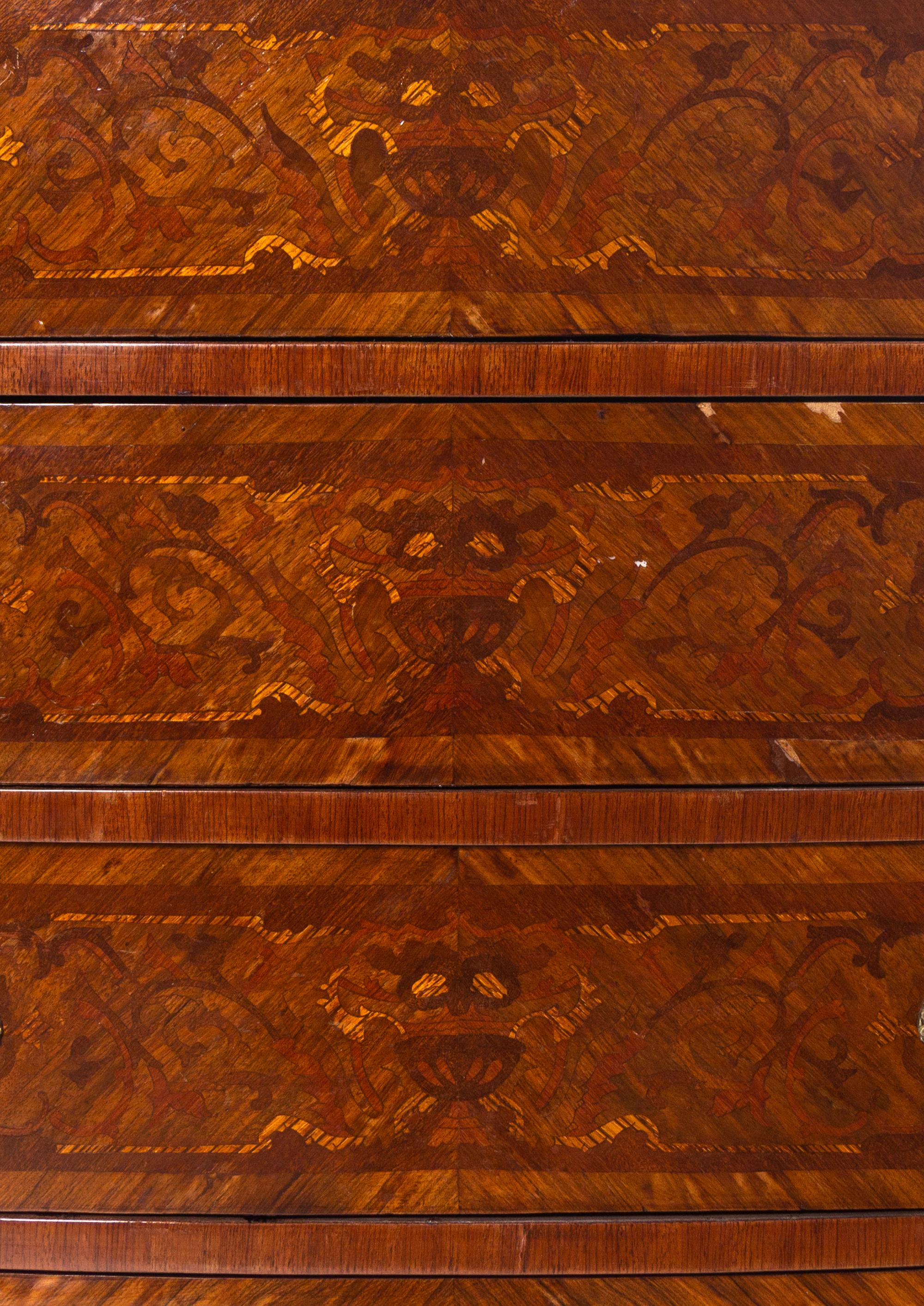 A Louis XV/XVI Transitional Style Gilt Bronze Mounted Marquetry Chest of Drawers