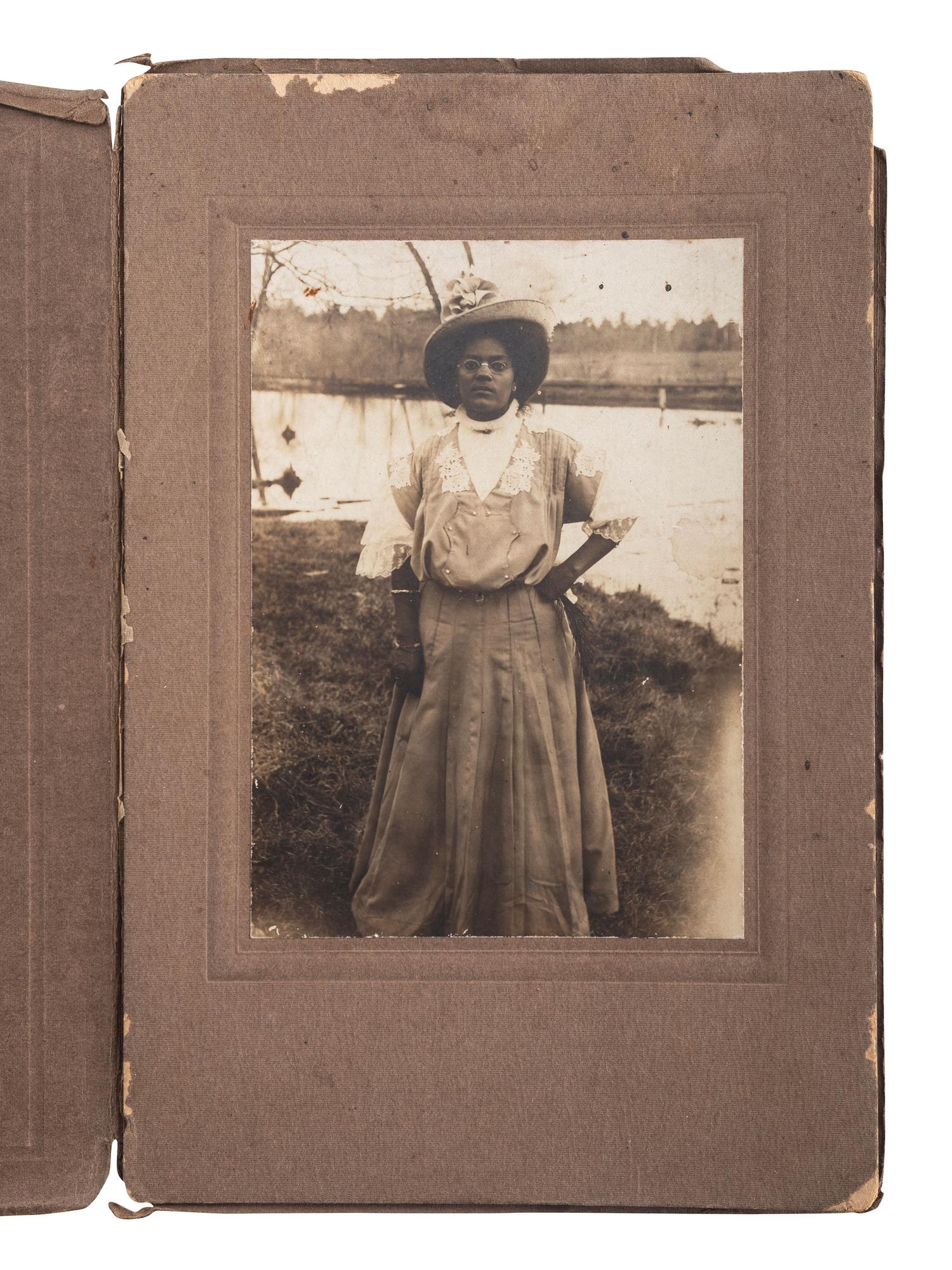 [EARLY PHOTOGRAPHY]. A group of 6 photographs of African American subjects, highlighted by lovely portrait of African American woman with white child.