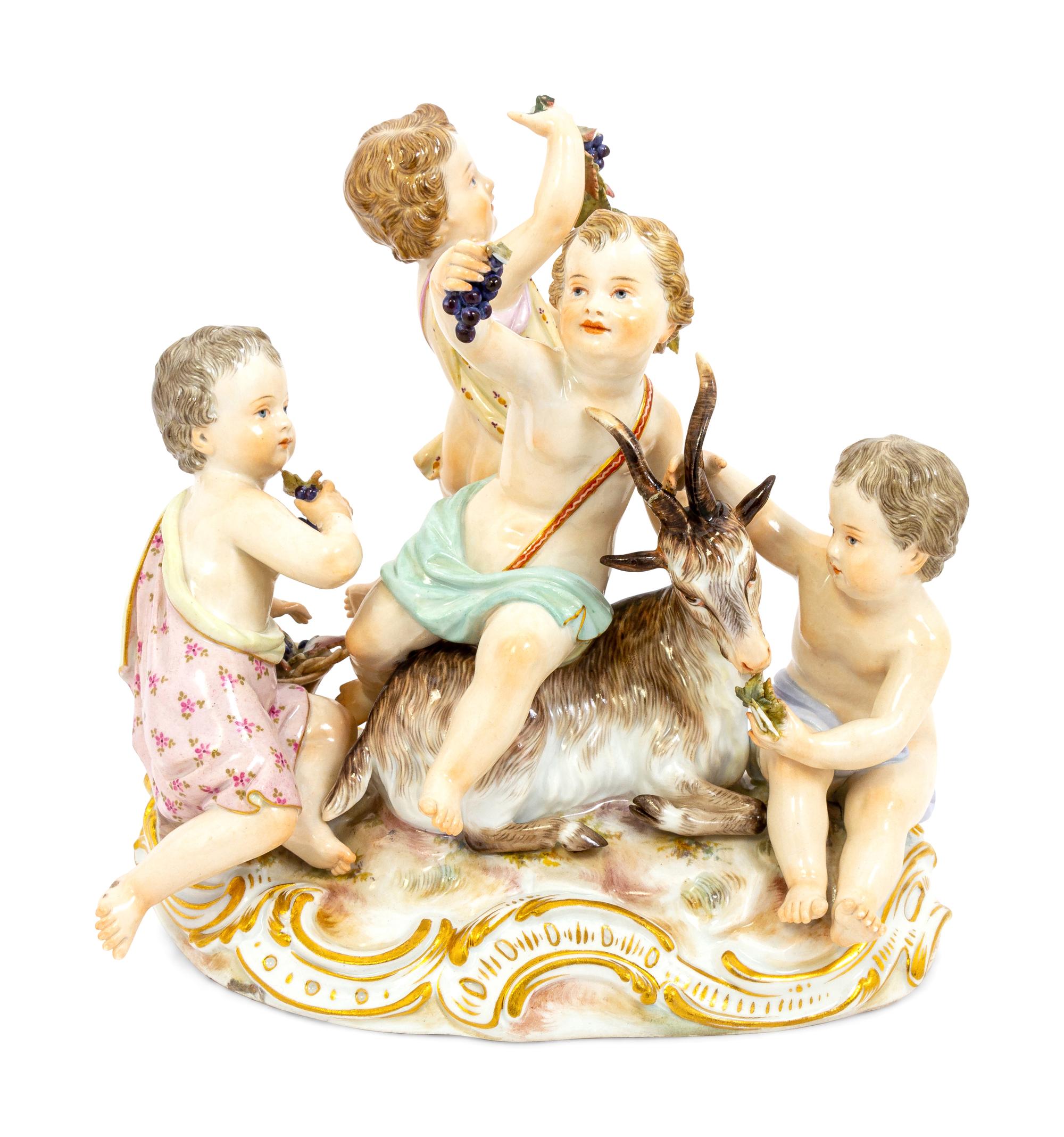 A Meissen Porcelain Group of Children Feeding a Goat