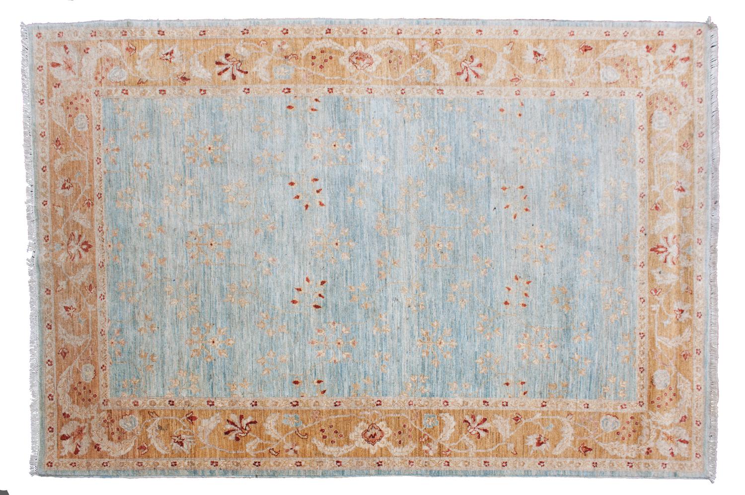 An Oushak Style Indian Wool Rug 9 feet 9 inches x 6 feet 8 inches. — 20TH CENTURY